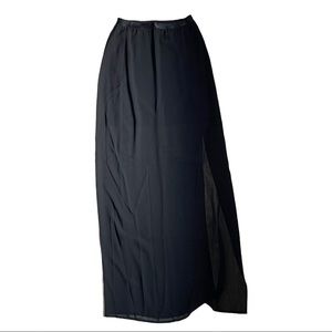 Black Bebe skirt.  Mini skirt with sheer overlay.